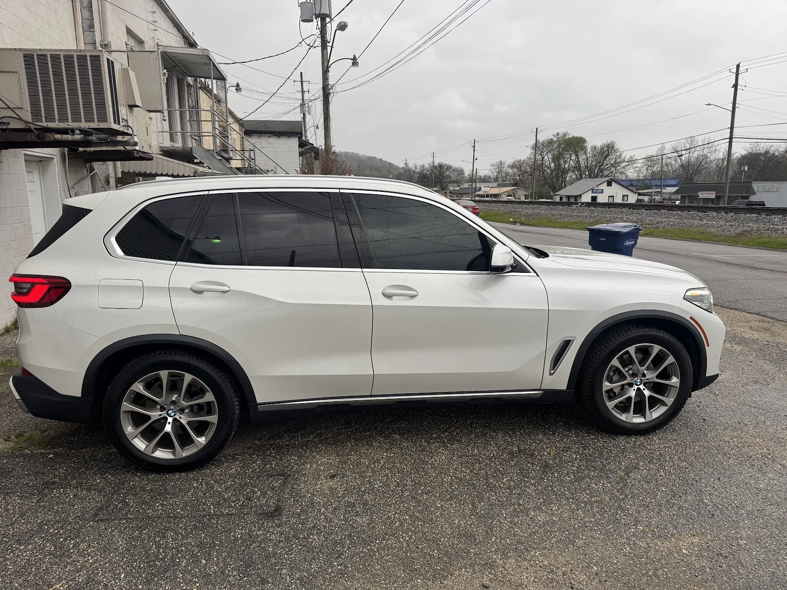 Inside Solar Defense Enterprise Window Tint — shop interior and work bay
